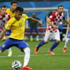 Brazil's Neymar scores from a penalty kick during the 2014 World Cup opening match between Brazil and Croatia at the Corinthians arena in Sao Paulo