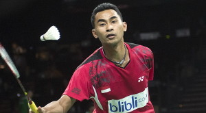 Sugiarto of Indonesia plays against Hu of Hong Kong during their men's singles match at the Badminton World Championship in Copenhagen